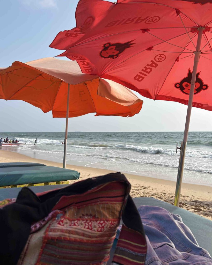 Umbrellas and chairs on the beach in Goa India