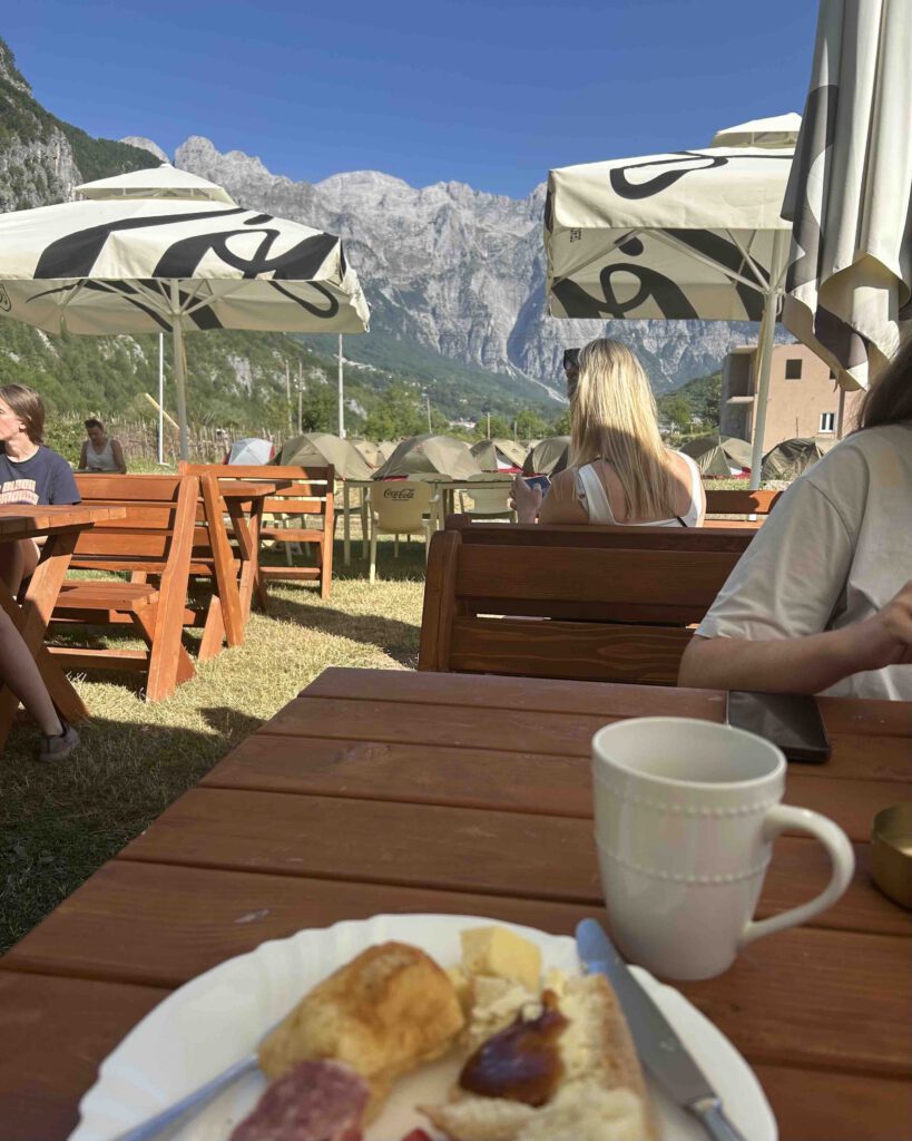 Breakfast surrounded by alps at Guesthouse Dreni before exploring Theth