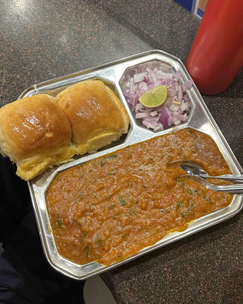 Pav Bhaji Mumbai street food, curry with bread rolls on the Contiki Eternal India street food tour in Mumabi