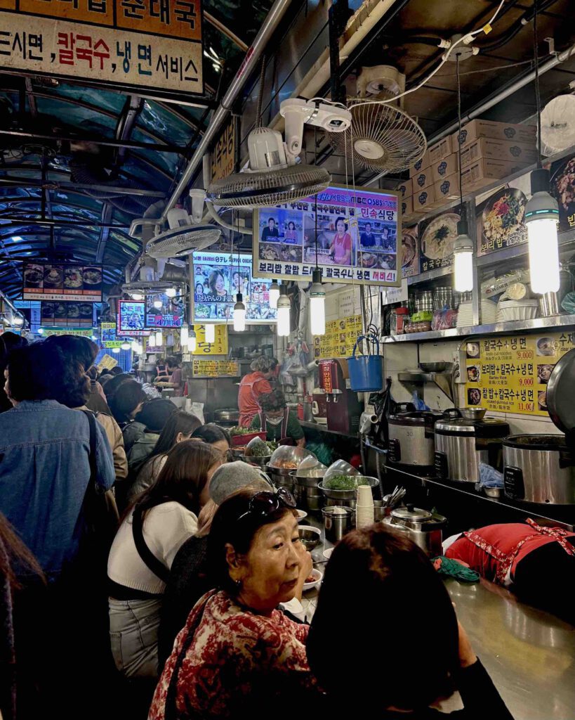 Busy food alley inside Namdaemun Market Seoul