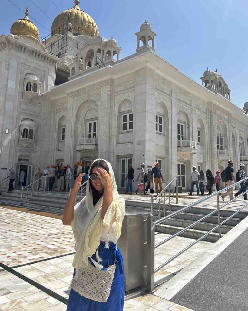 A solo female traveller on the Eternal India Contiki tour wearing a scarf
