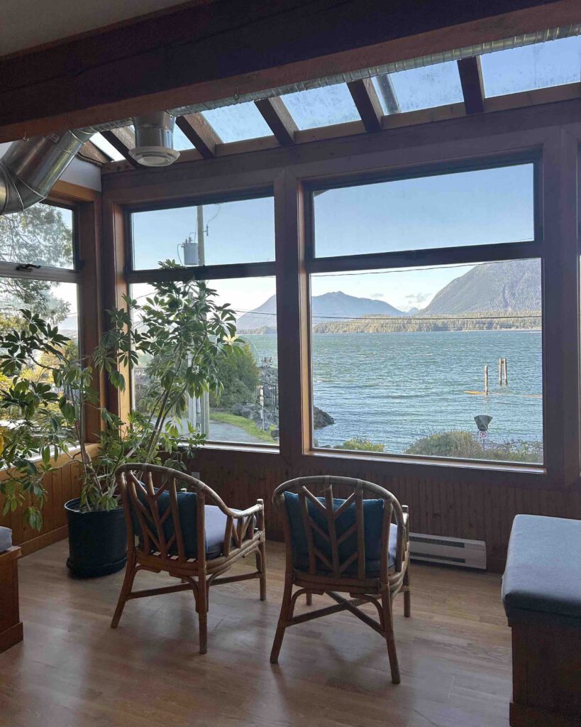 Ocean view from inside Whalers Guesthouse common area in spring Tofino British Columbia