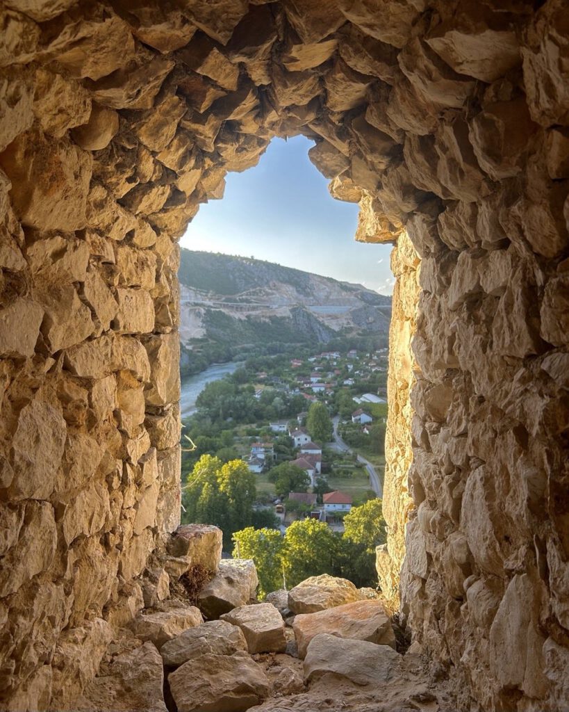 Stone window in the fortress tower overlooking Počitelj
