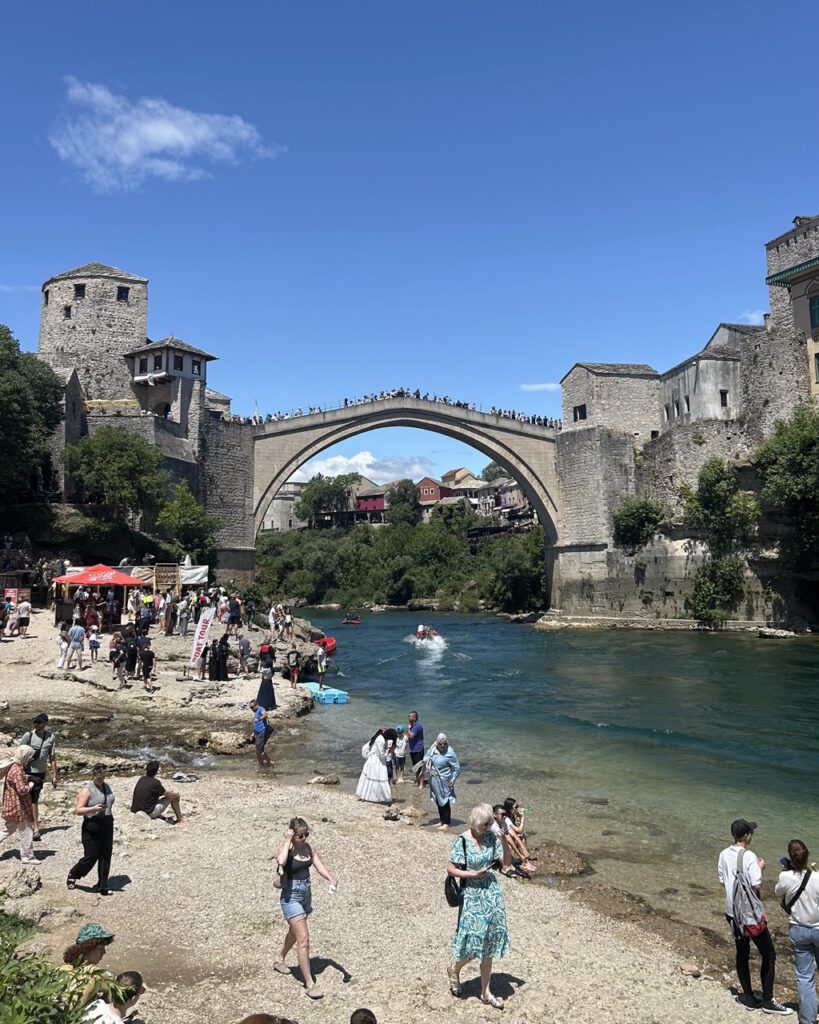 Bridge divers preparing to jump from Stari Most in Mostar
