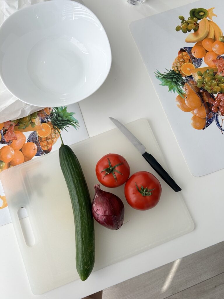 Cooking in a Tiranë apartment kitchen while backpacking Albania